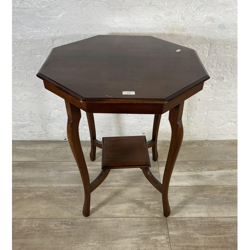 53 - An Edwardian mahogany octagonal two tier side table - approx. 73cm high x 61cm wide x 61cm deep