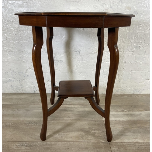 53 - An Edwardian mahogany octagonal two tier side table - approx. 73cm high x 61cm wide x 61cm deep