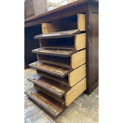 54 - A mid 20th century bespoke oak office desk with five fall front drawers - approx. 62cm high x 107cm ... 