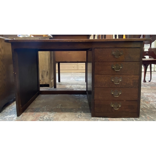 54 - A mid 20th century bespoke oak office desk with five fall front drawers - approx. 62cm high x 107cm ... 