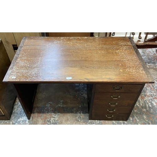 54 - A mid 20th century bespoke oak office desk with five fall front drawers - approx. 62cm high x 107cm ... 