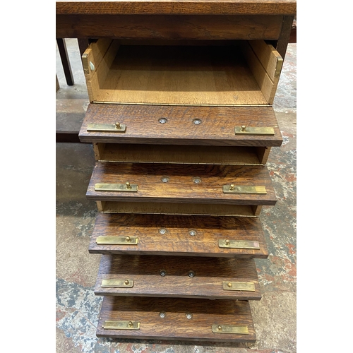 54 - A mid 20th century bespoke oak office desk with five fall front drawers - approx. 62cm high x 107cm ... 