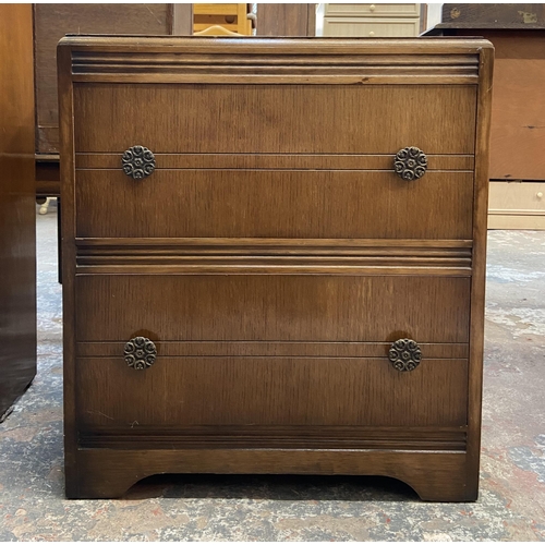 56 - A mid 20th century oak chest of drawers - approx. 70cm high x 61cm wide x 43cm deep