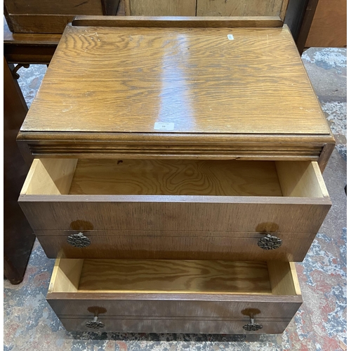 56 - A mid 20th century oak chest of drawers - approx. 70cm high x 61cm wide x 43cm deep