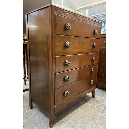 58 - A Lebus carved oak chest of drawers - approx. 101cm high x 77cm wide x 41cm deep