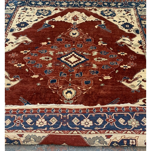 6 - An Iranian Heriz hand woven 100% wool pile rug - approx. 295cm x 247cm