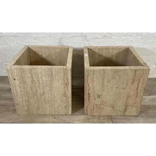 64 - Two travertine coffee table bases