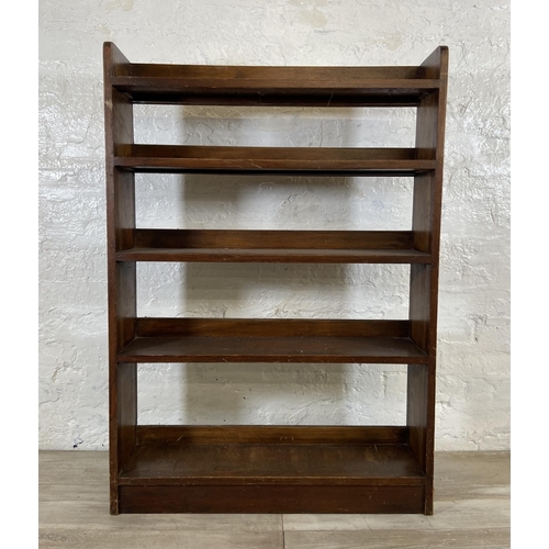 65 - A mid 20th century pine and plywood five tier bookcase - approx. 109cm high x 76cm wide x 18cm deep