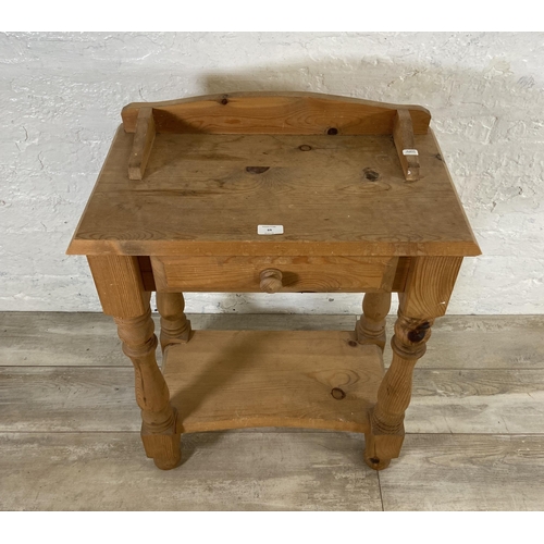 69 - A Victorian style pine two tier side table - approx. 81cm high x 60cm wide x 36cm deep