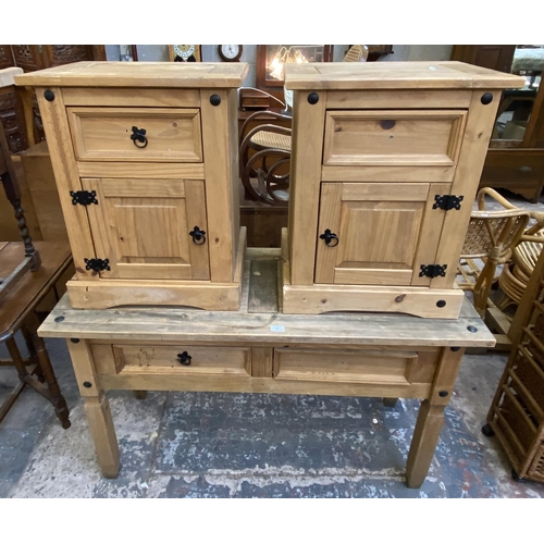 73 - Three pieces of Mexican pine furniture, two bedside cabinets and one console table