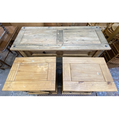 73 - Three pieces of Mexican pine furniture, two bedside cabinets and one console table