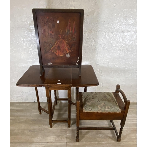 74 - Three pieces of early 20th century furniture, one oak framed hand painted leather fire screen, one o... 