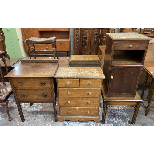 75 - Four pieces of furniture, one early 20th century carved oak chest of drawers, one pine chest of draw... 