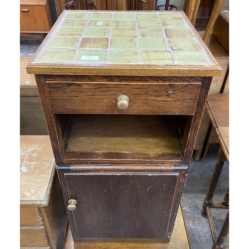 75 - Four pieces of furniture, one early 20th century carved oak chest of drawers, one pine chest of draw... 