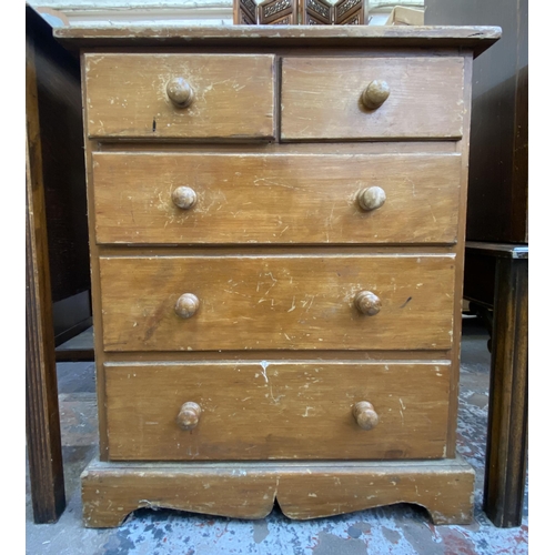 75 - Four pieces of furniture, one early 20th century carved oak chest of drawers, one pine chest of draw... 