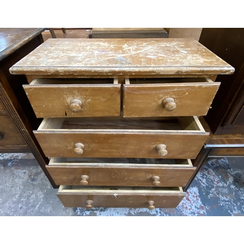 75 - Four pieces of furniture, one early 20th century carved oak chest of drawers, one pine chest of draw... 