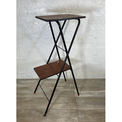 81 - Two pieces of mid 20th century furniture, one teak and black metal folding projector stand and one o... 