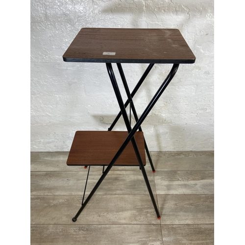 81 - Two pieces of mid 20th century furniture, one teak and black metal folding projector stand and one o... 