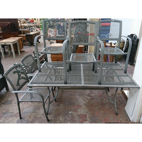 84 - A grey metal six piece patio set comprising rectangular table and five armchairs - approx. 75cm high... 