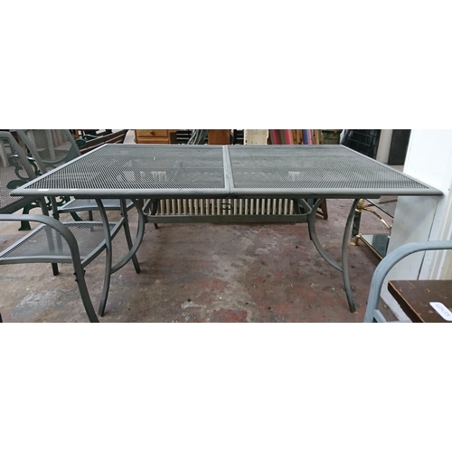 84 - A grey metal six piece patio set comprising rectangular table and five armchairs - approx. 75cm high... 