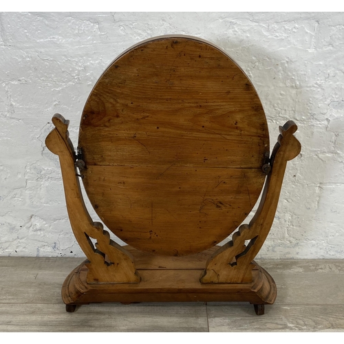 9 - A Victorian carved walnut framed swing dressing table mirror - approx. 66cm high x 54cm wide x 24cm ... 