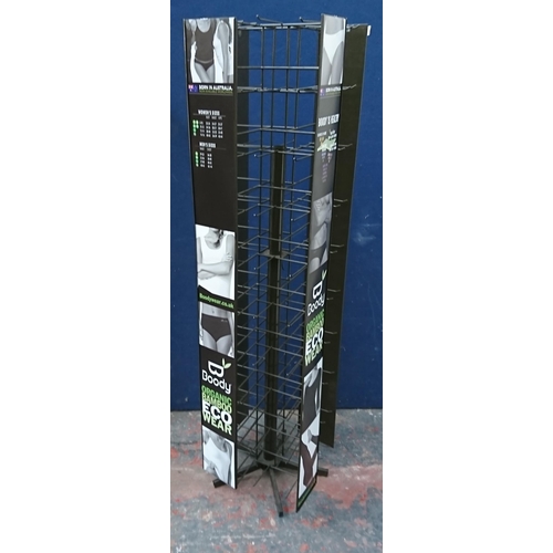 91 - A metal revolving shop display rack - approx. 145cm high