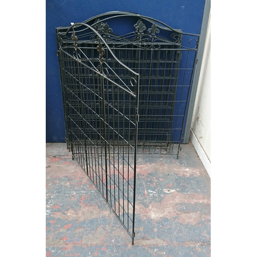 92 - Eight black metal garden gates - approx. 113cm high x 92cm wide