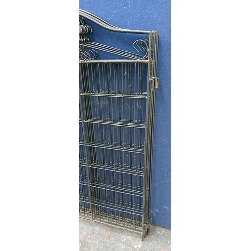 92 - Eight black metal garden gates - approx. 113cm high x 92cm wide