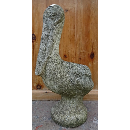 97 - A cast stone pelican garden planter - approx. 56cm high