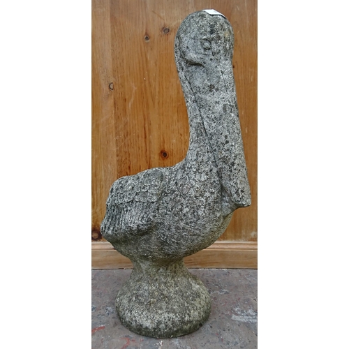 97 - A cast stone pelican garden planter - approx. 56cm high