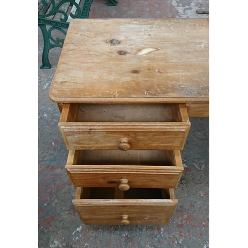 98A - A Victorian style pine three drawer pedestal desk - approx. 74cm high x 130cm wide x 52cm deep