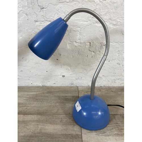 152 - Two desk lamps, one Micromark white metal and one Arnold Smart Ltd Model 6009 blue metal gooseneck