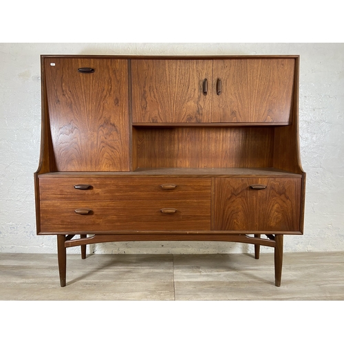 153 - A mid 20th century G Plan Brasilia teak highboard - approx. 136cm high x 152cm wide x 44cm deep