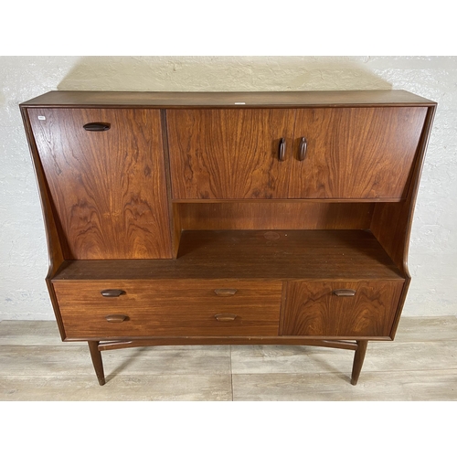 153 - A mid 20th century G Plan Brasilia teak highboard - approx. 136cm high x 152cm wide x 44cm deep