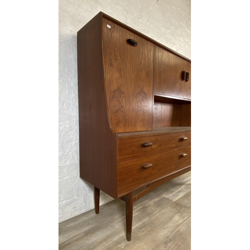 153 - A mid 20th century G Plan Brasilia teak highboard - approx. 136cm high x 152cm wide x 44cm deep