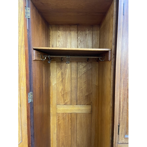 156 - An Edwardian inlaid mahogany compactum wardrobe - approx. 211cm high x 192cm wide x 58cm deep