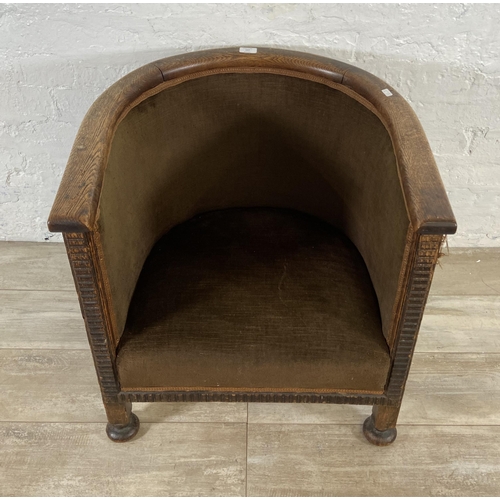 157 - An Edwardian carved oak and brown fabric upholstered tub chair - approx. 64cm high x 62cm wide x 57c... 