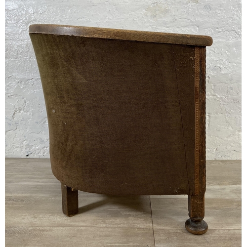 157 - An Edwardian carved oak and brown fabric upholstered tub chair - approx. 64cm high x 62cm wide x 57c... 