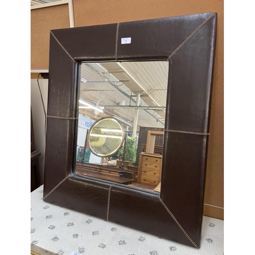 158 - A modern brown leather framed wall mirror - approx. 79cm high x 69cm wide