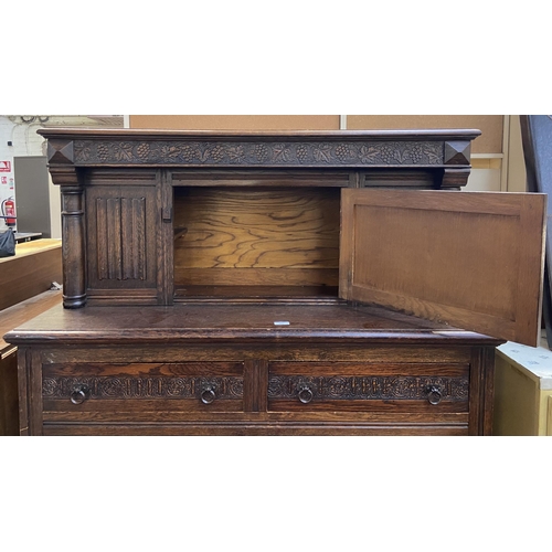 160 - A 17th century style carved oak court cupboard - approx. 153cm high x 121cm wide x 48cm deep