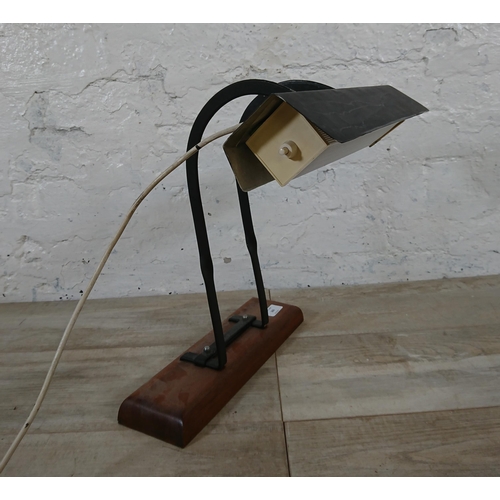 163 - A mid 20th century black painted desk lamp in mahogany plinth - approx. 39cm high x 35cm wide