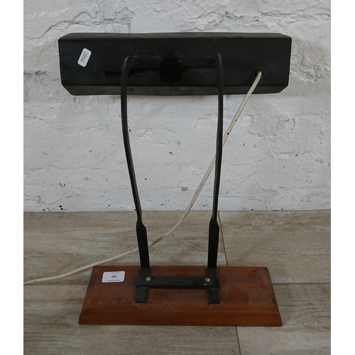 163 - A mid 20th century black painted desk lamp in mahogany plinth - approx. 39cm high x 35cm wide