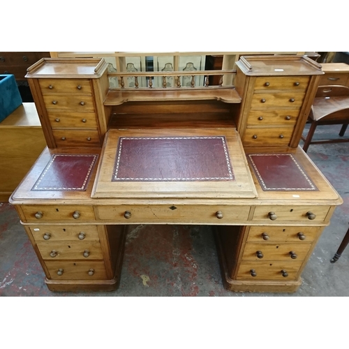 164 - A Victorian mahogany and red leather Dickens desk - approx. 119cm high x 150cm wide x 75cm deep