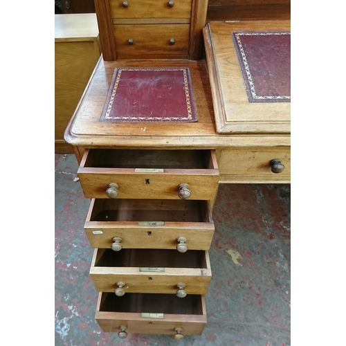 164 - A Victorian mahogany and red leather Dickens desk - approx. 119cm high x 150cm wide x 75cm deep