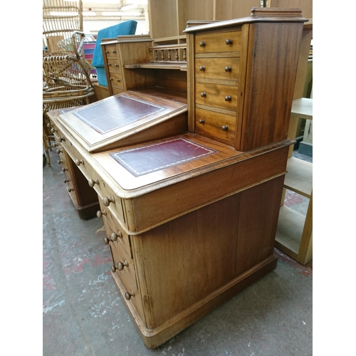 164 - A Victorian mahogany and red leather Dickens desk - approx. 119cm high x 150cm wide x 75cm deep