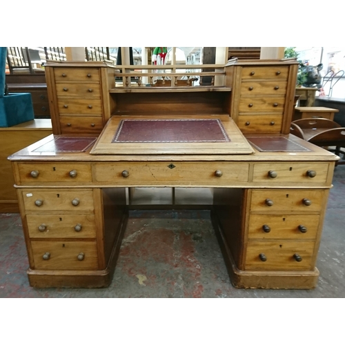 164 - A Victorian mahogany and red leather Dickens desk - approx. 119cm high x 150cm wide x 75cm deep