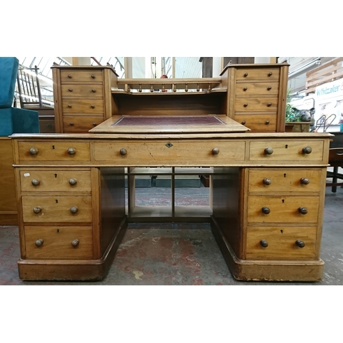 164 - A Victorian mahogany and red leather Dickens desk - approx. 119cm high x 150cm wide x 75cm deep