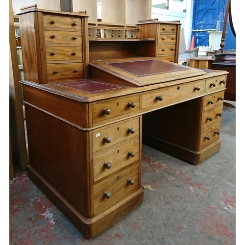 164 - A Victorian mahogany and red leather Dickens desk - approx. 119cm high x 150cm wide x 75cm deep