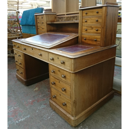 164 - A Victorian mahogany and red leather Dickens desk - approx. 119cm high x 150cm wide x 75cm deep