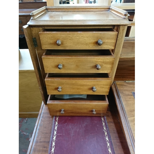 164 - A Victorian mahogany and red leather Dickens desk - approx. 119cm high x 150cm wide x 75cm deep